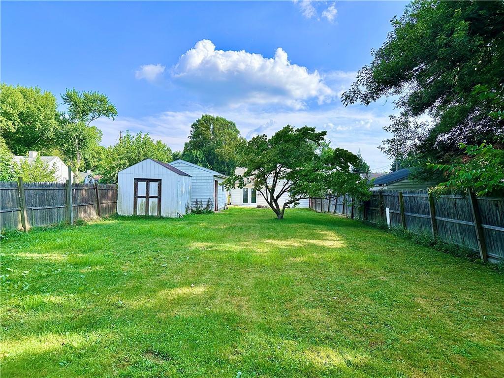 1920 Robinwood Street New Castle, PA 16101 - Photo 16 of 16 a view of a house with backyard and garden