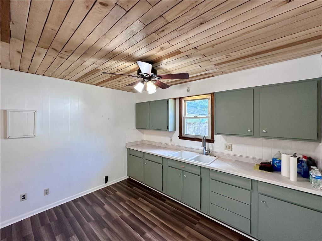 1920 Robinwood Street New Castle, PA 16101 - Photo 6 of 16 a bathroom with a sink and a mirror
