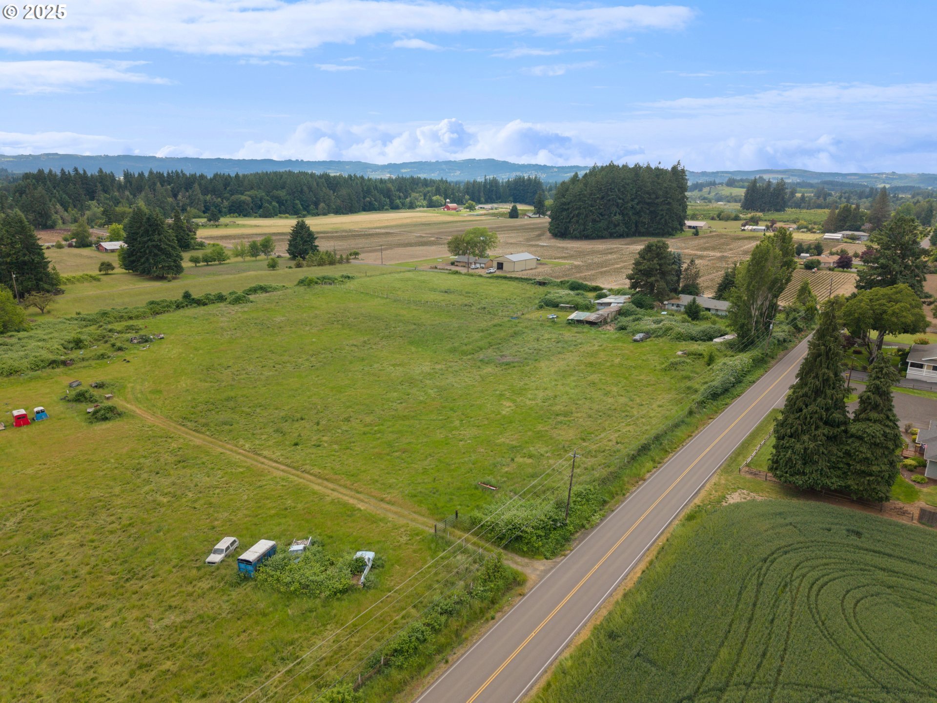 7044 Southwest Jacktown Road Beaverton, OR 97078 - Photo 2 of 14 a view of a lake with a yard