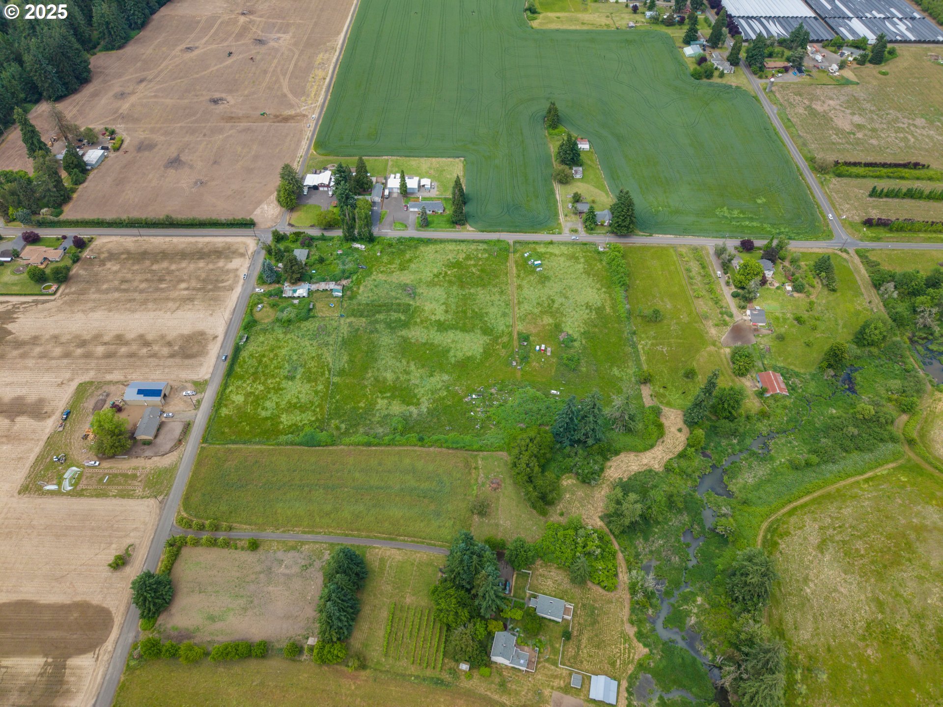 7044 Southwest Jacktown Road Beaverton, OR 97078 - Photo 7 of 14 an aerial view of a house with a yard