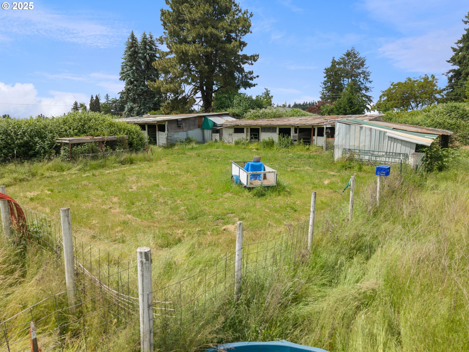 7044 Southwest Jacktown Road Beaverton, OR 97078 - Photo 10 of 14 a view of a house with a yard