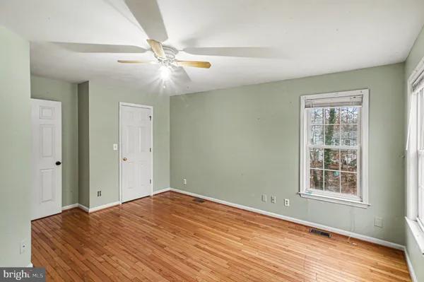 a bathroom with a sink a mirror and a toilet