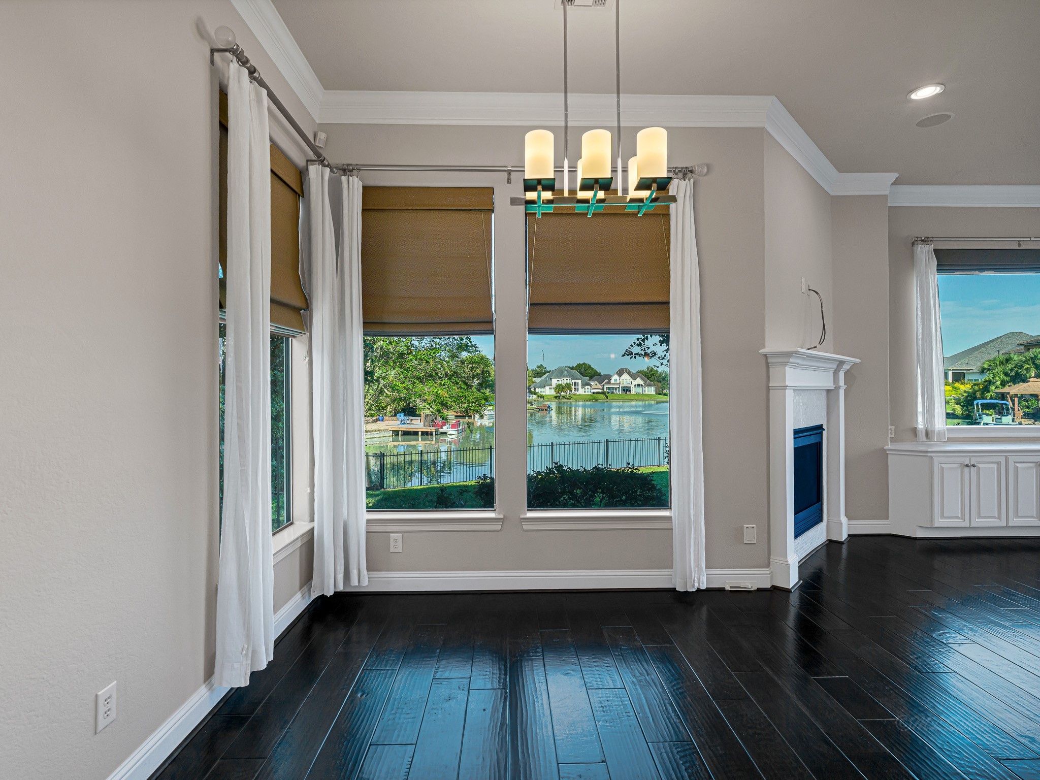 1802 Sparrows Ridge Katy, TX 77450 - Photo 17 of 50 a view of a room with wooden floor chandeliers and kitchen