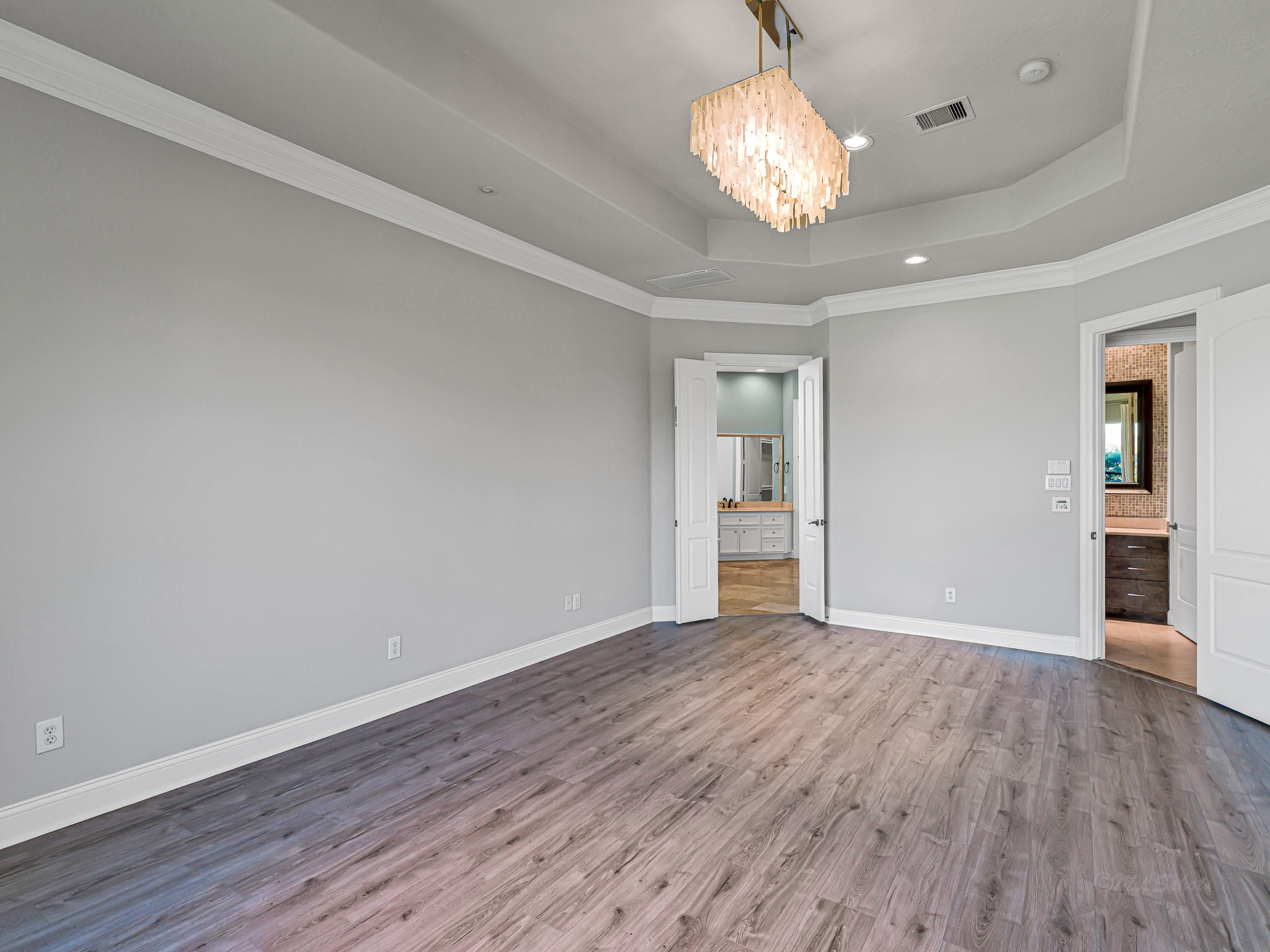 1802 Sparrows Ridge Katy, TX 77450 - Photo 29 of 50 a view of an empty room with wooden floor and a window