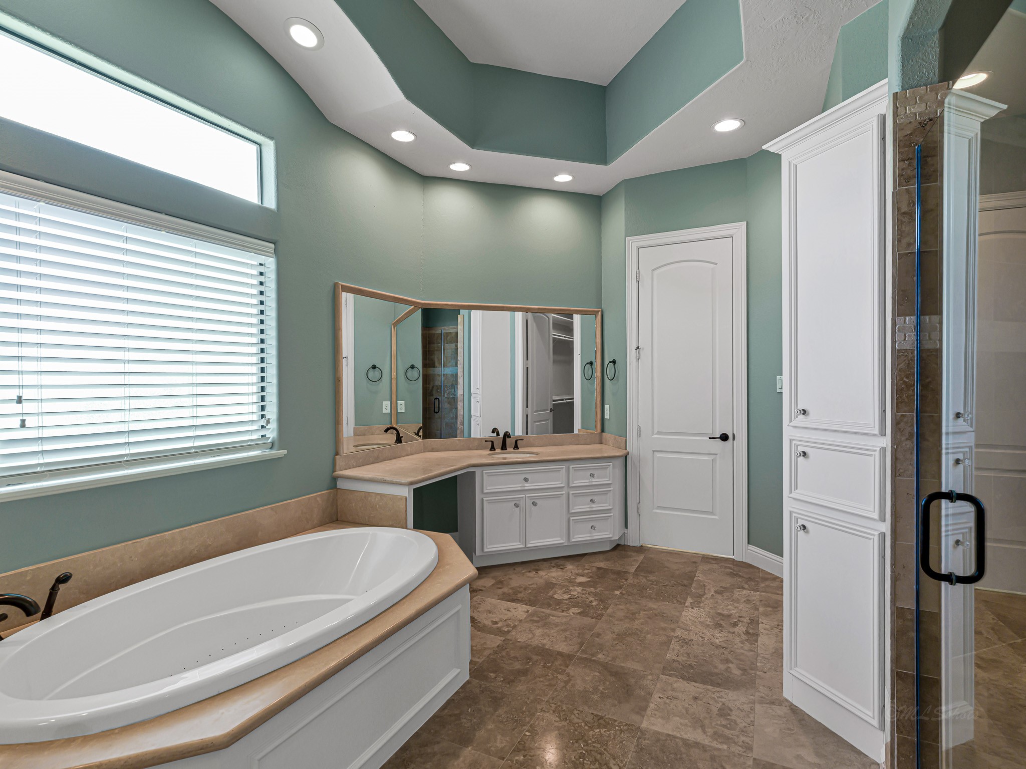 1802 Sparrows Ridge Katy, TX 77450 - Photo 30 of 50 a spacious bathroom with a tub sink and mirror