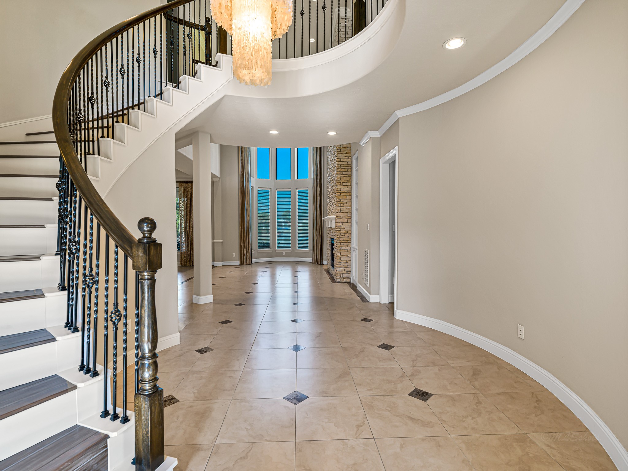1802 Sparrows Ridge Katy, TX 77450 - Photo 4 of 50 a view of entryway and hall with wooden floor