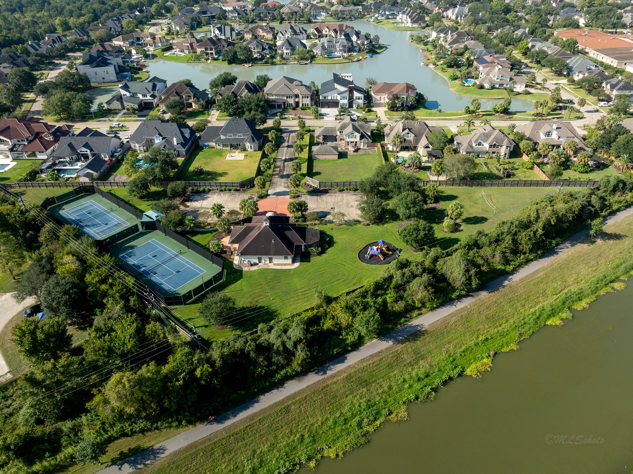 1802 Sparrows Ridge Katy, TX 77450 - Photo 50 of 50 an aerial view of residential houses with outdoor space and swimming pool