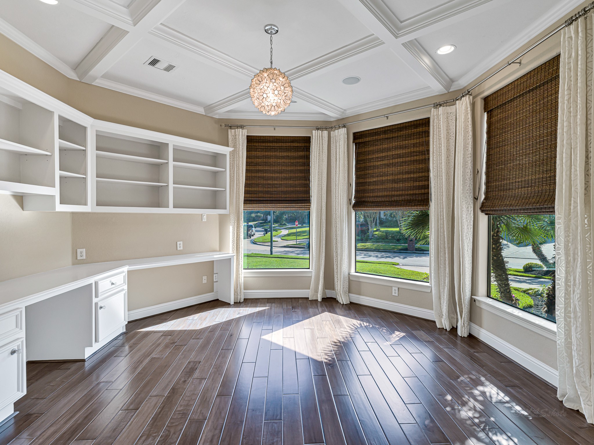 1802 Sparrows Ridge Katy, TX 77450 - Photo 6 of 50 a view of an empty room with a window and wooden floor