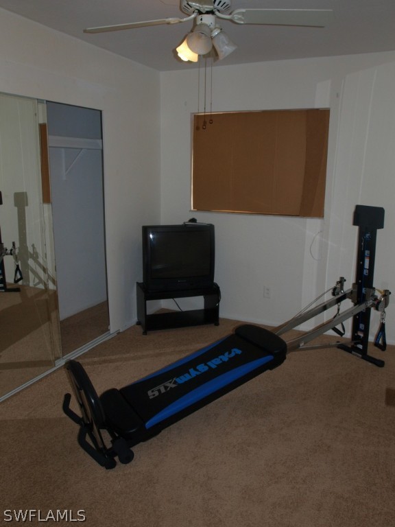 13034 First Street Fort Myers, FL 33905 - Photo 13 of 18 a living room with furniture pool table and a flat screen tv