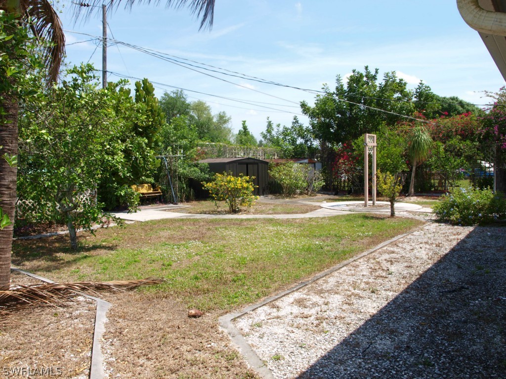 13034 First Street Fort Myers, FL 33905 - Photo 18 of 18 a view of yard with tree