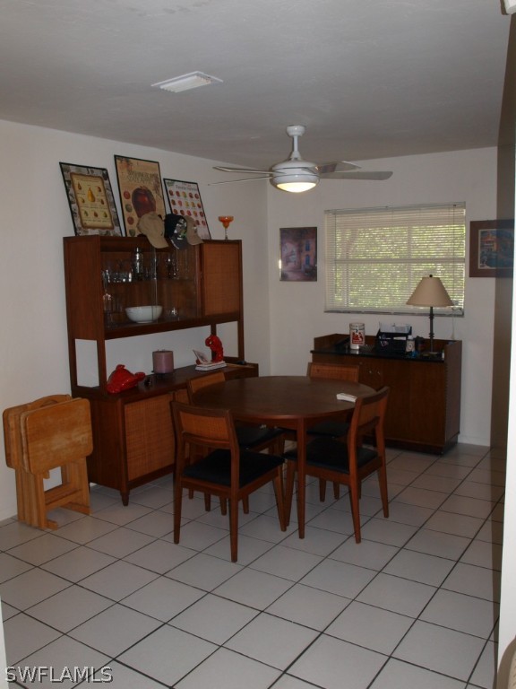 13034 First Street Fort Myers, FL 33905 - Photo 10 of 18 a view of workspace with furniture and window