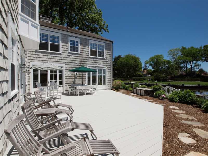 3 Coves End Road Darien, CT 06820 - Photo 17 of 22 a view of a house with backyard and sitting area