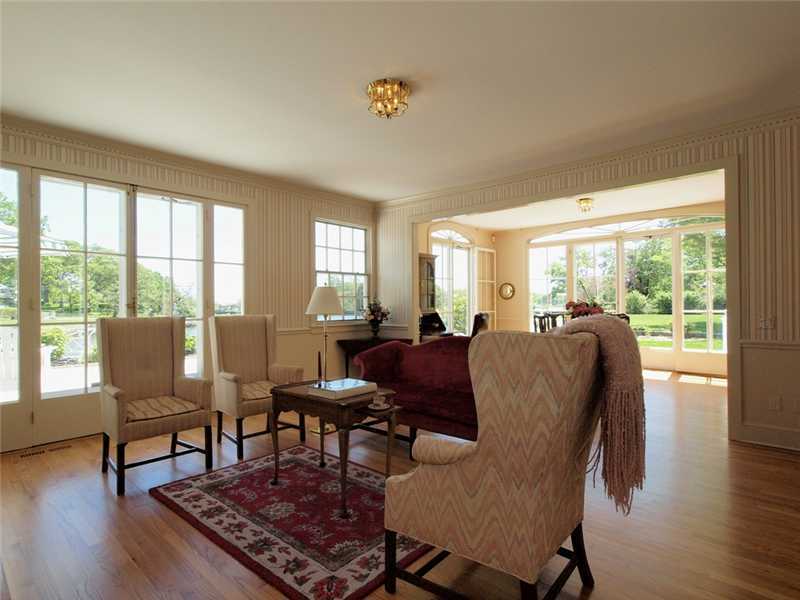 3 Coves End Road Darien, CT 06820 - Photo 7 of 22 a living room with furniture and a wooden floor