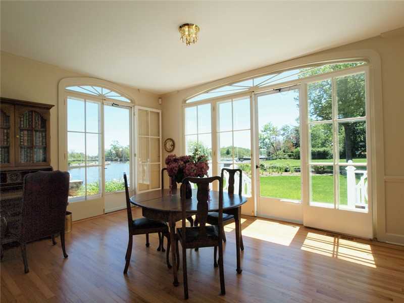 3 Coves End Road Darien, CT 06820 - Photo 8 of 22 a view of a dining room with furniture window and wooden floor