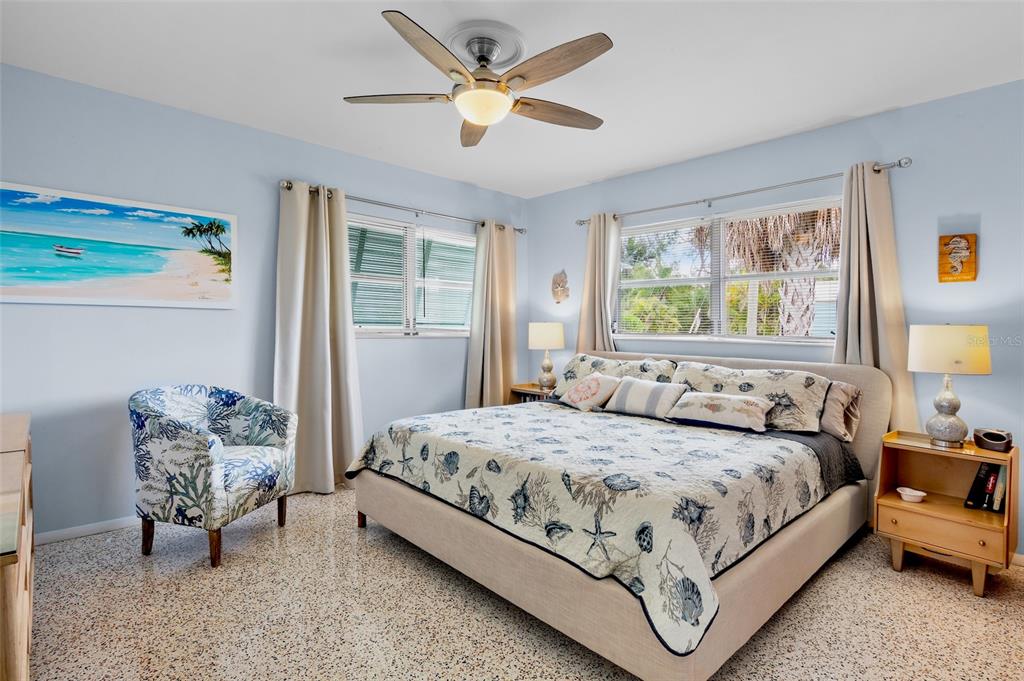 223 Roberts Road Nokomis, FL 34275 - Photo 19 of 27 a bedroom with a bed and a window