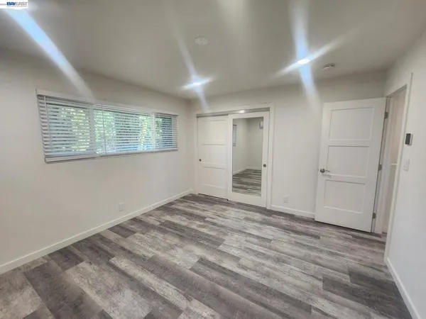 an empty room with windows