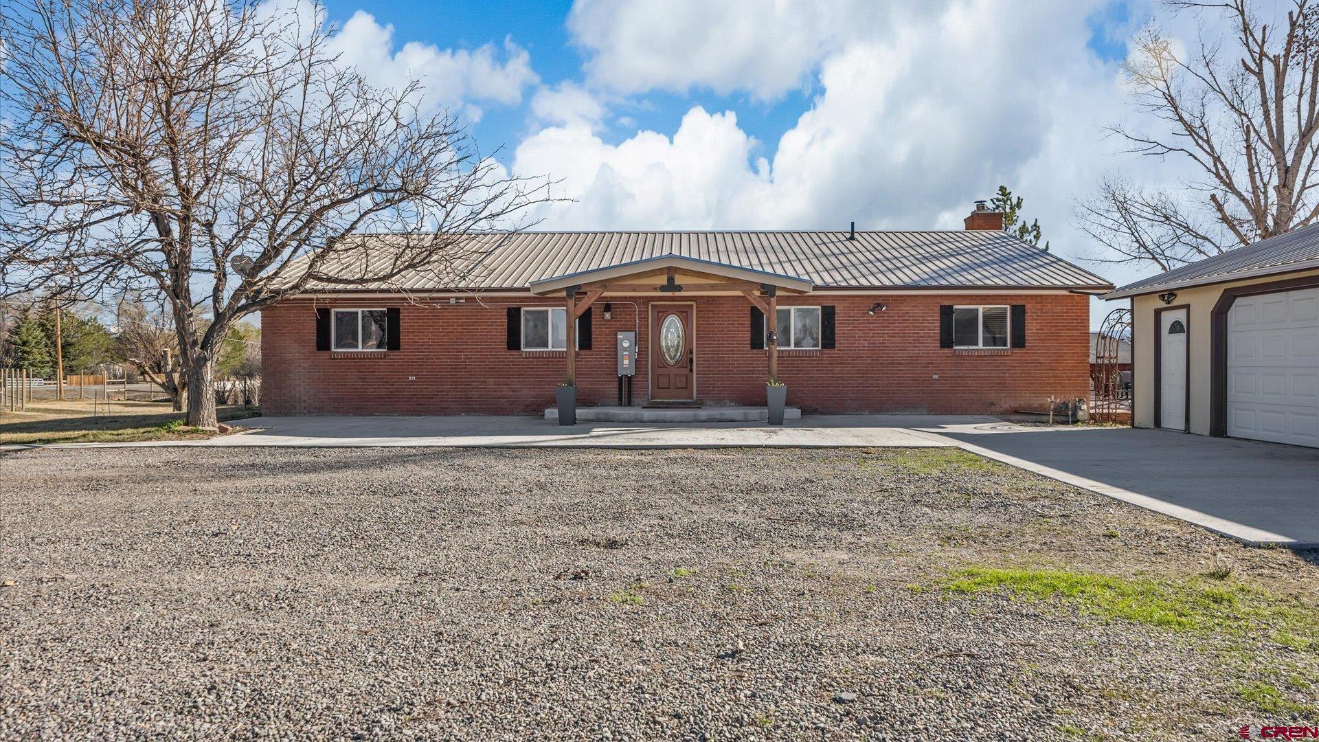 a front view of house with yard