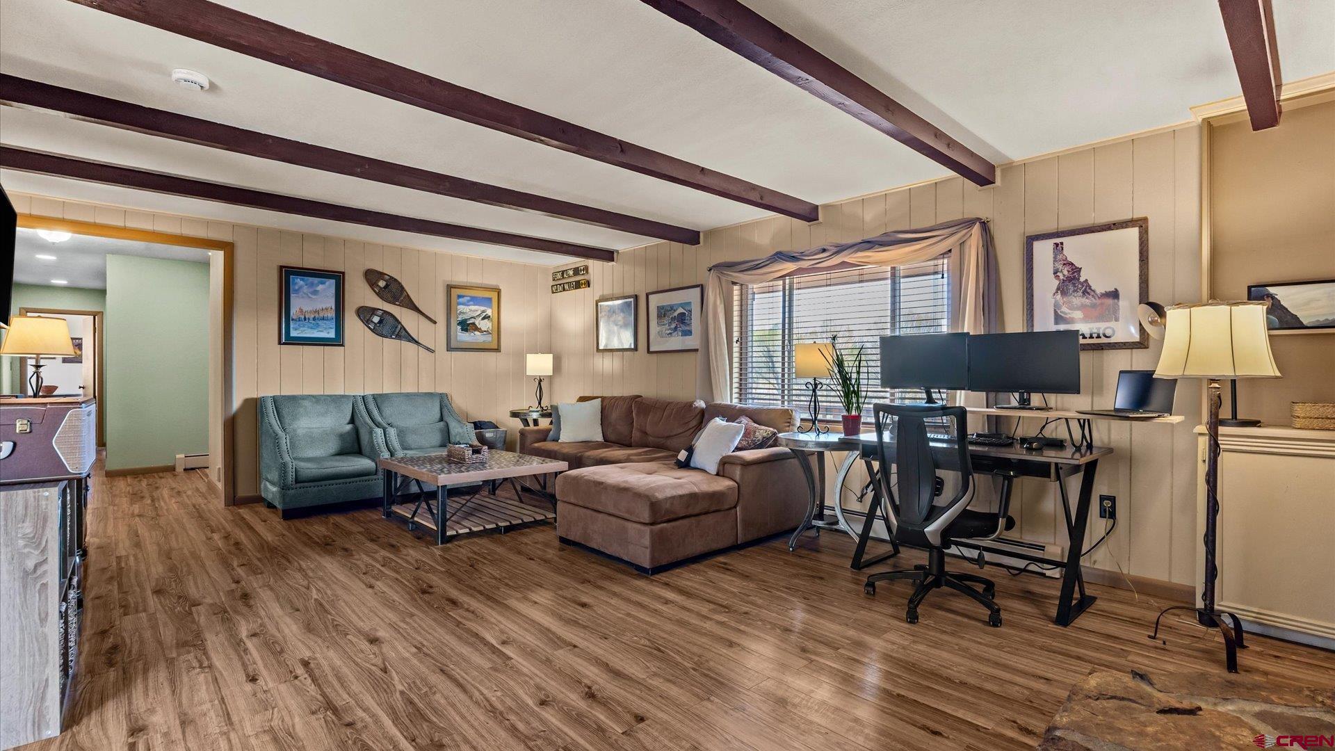 16205 6700th Road Montrose, CO 81401 - Photo 30 of 34 a living room with furniture and a flat screen tv