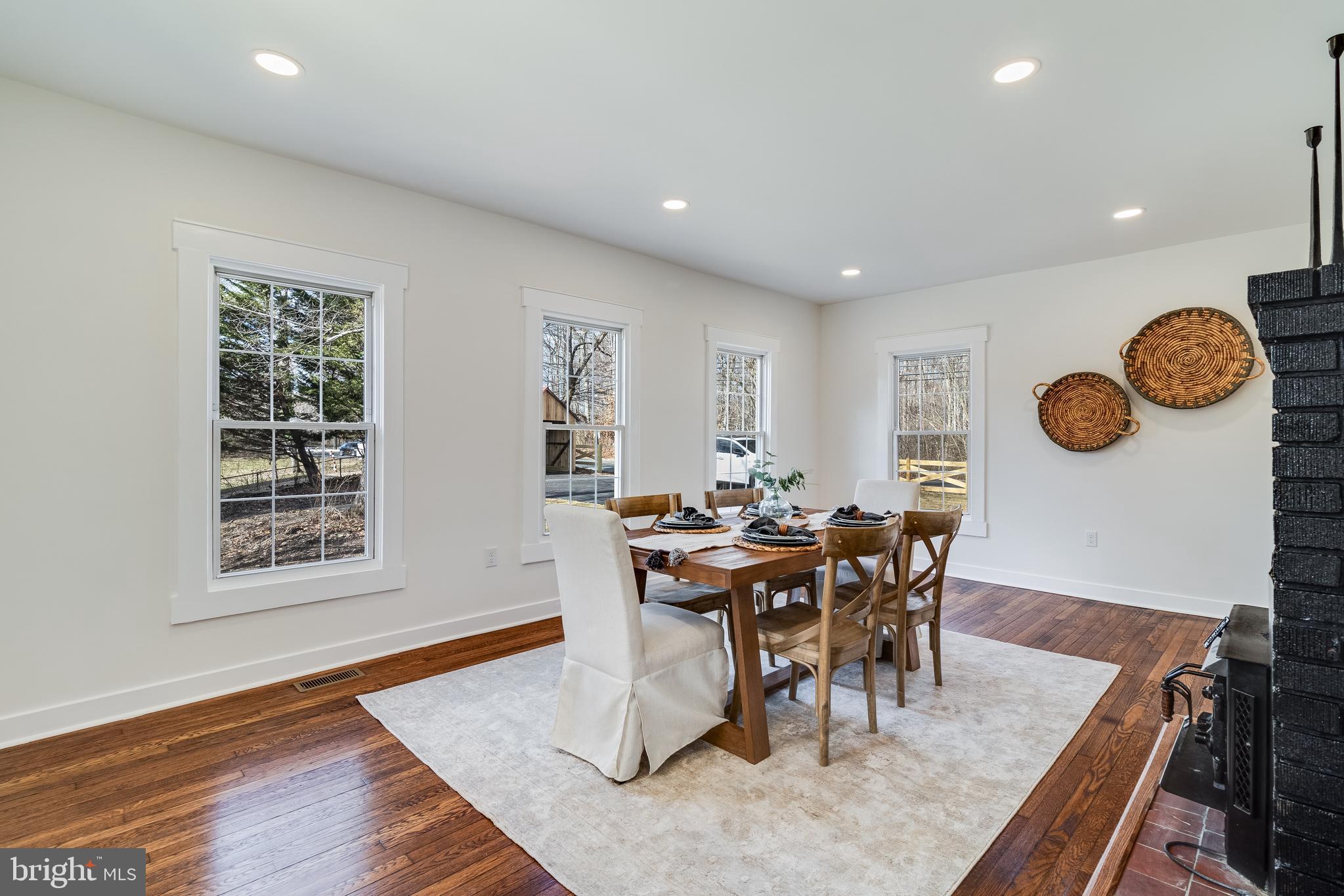 9316 Croom Road Upper Marlboro, MD 20772 - Photo 17 of 61 a view of a dining room with furniture and chandelier