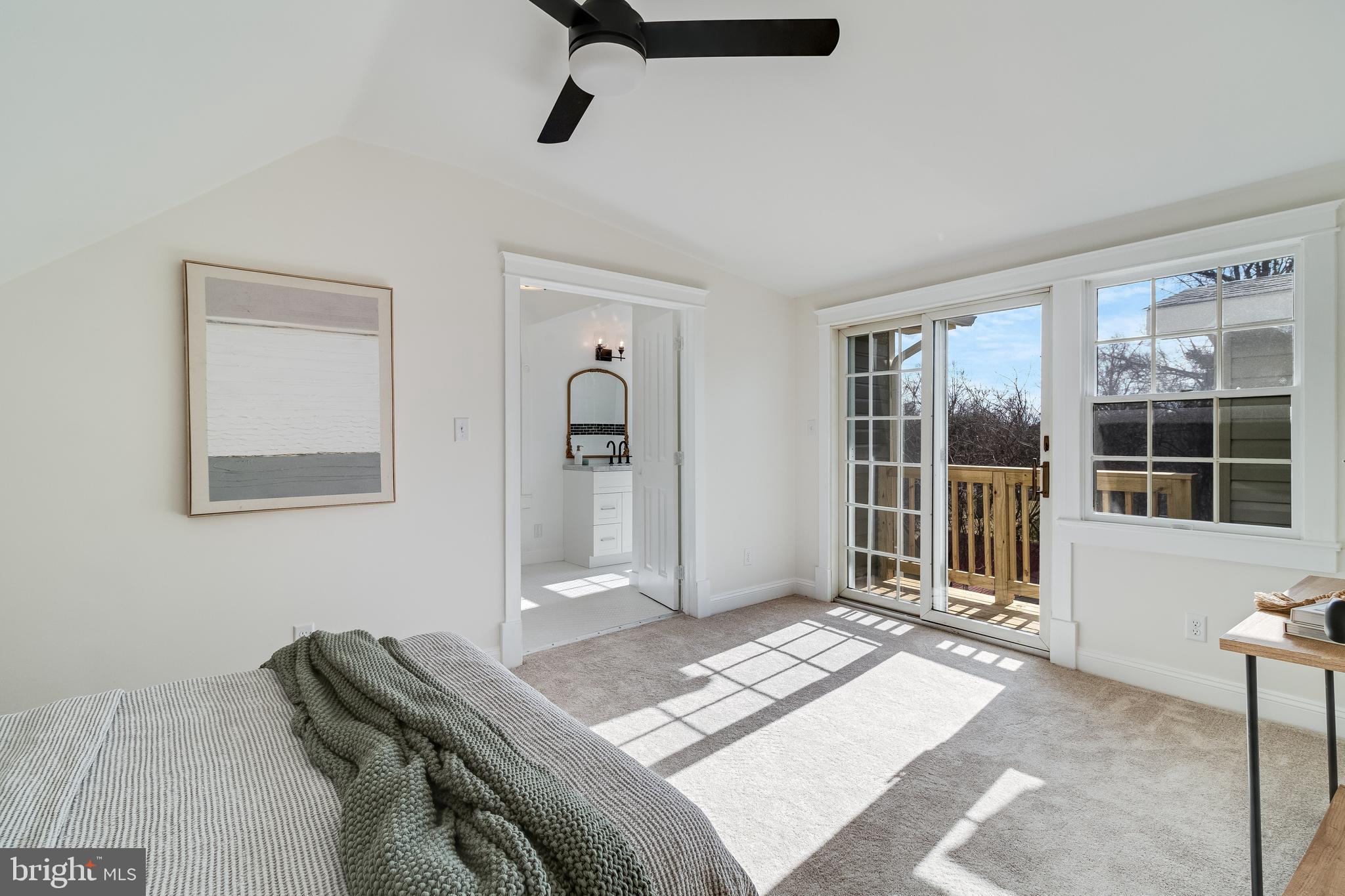 9316 Croom Road Upper Marlboro, MD 20772 - Photo 33 of 61 a bedroom with a bed and a window