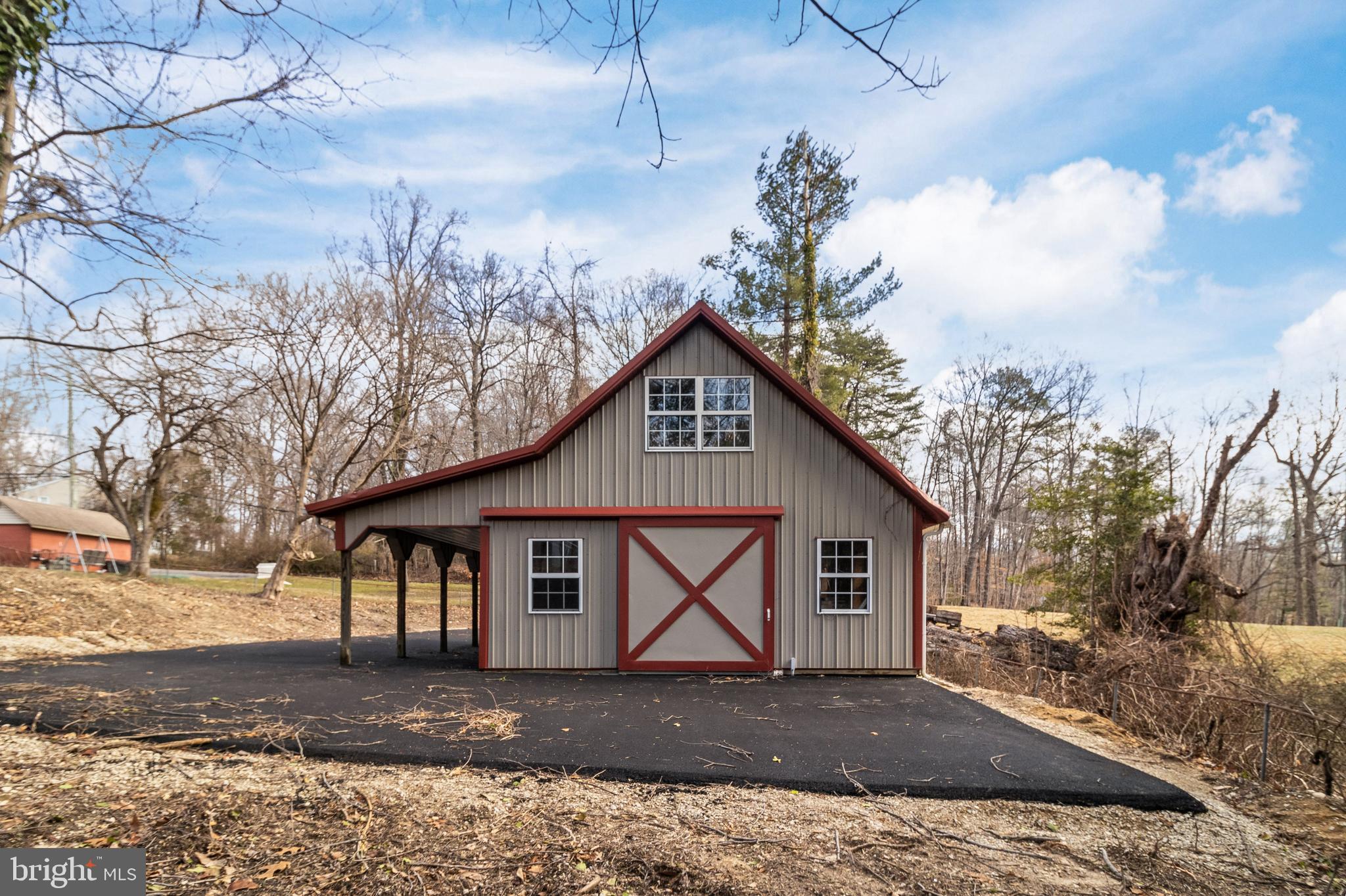 9316 Croom Road Upper Marlboro, MD 20772 - Photo 46 of 61 a view of a house with a yard