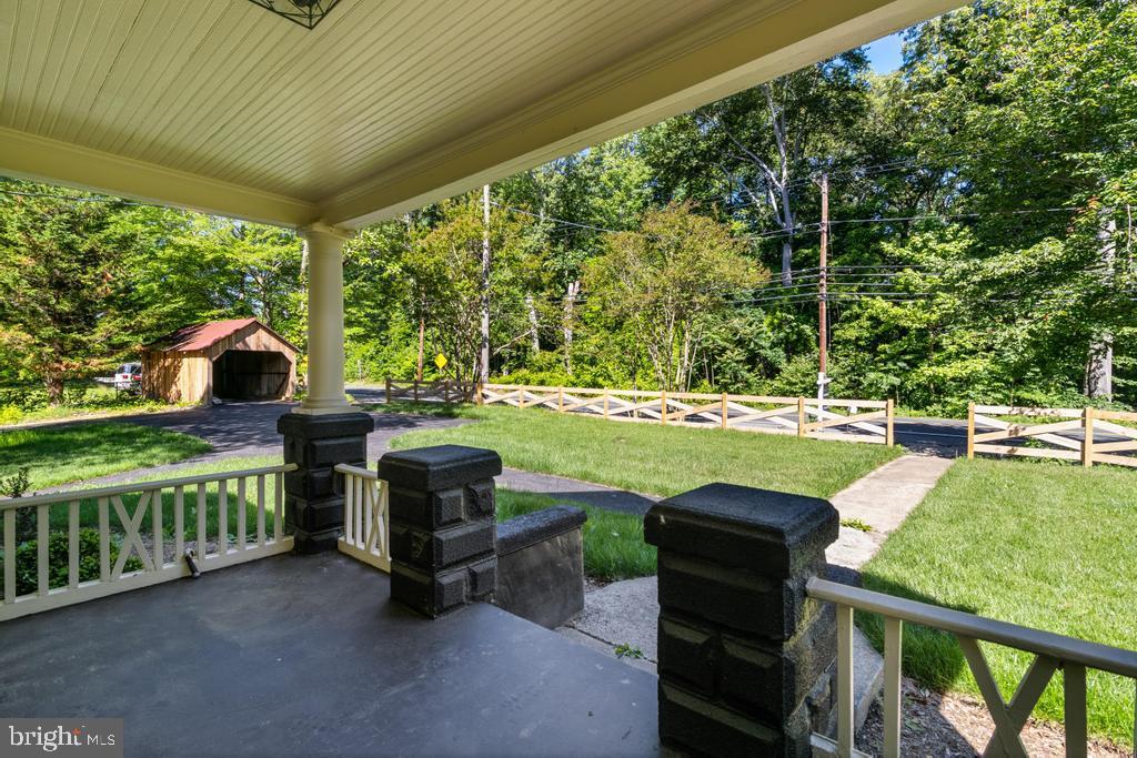 9316 Croom Road Upper Marlboro, MD 20772 - Photo 5 of 61 a view of a two chairs and table in the patio