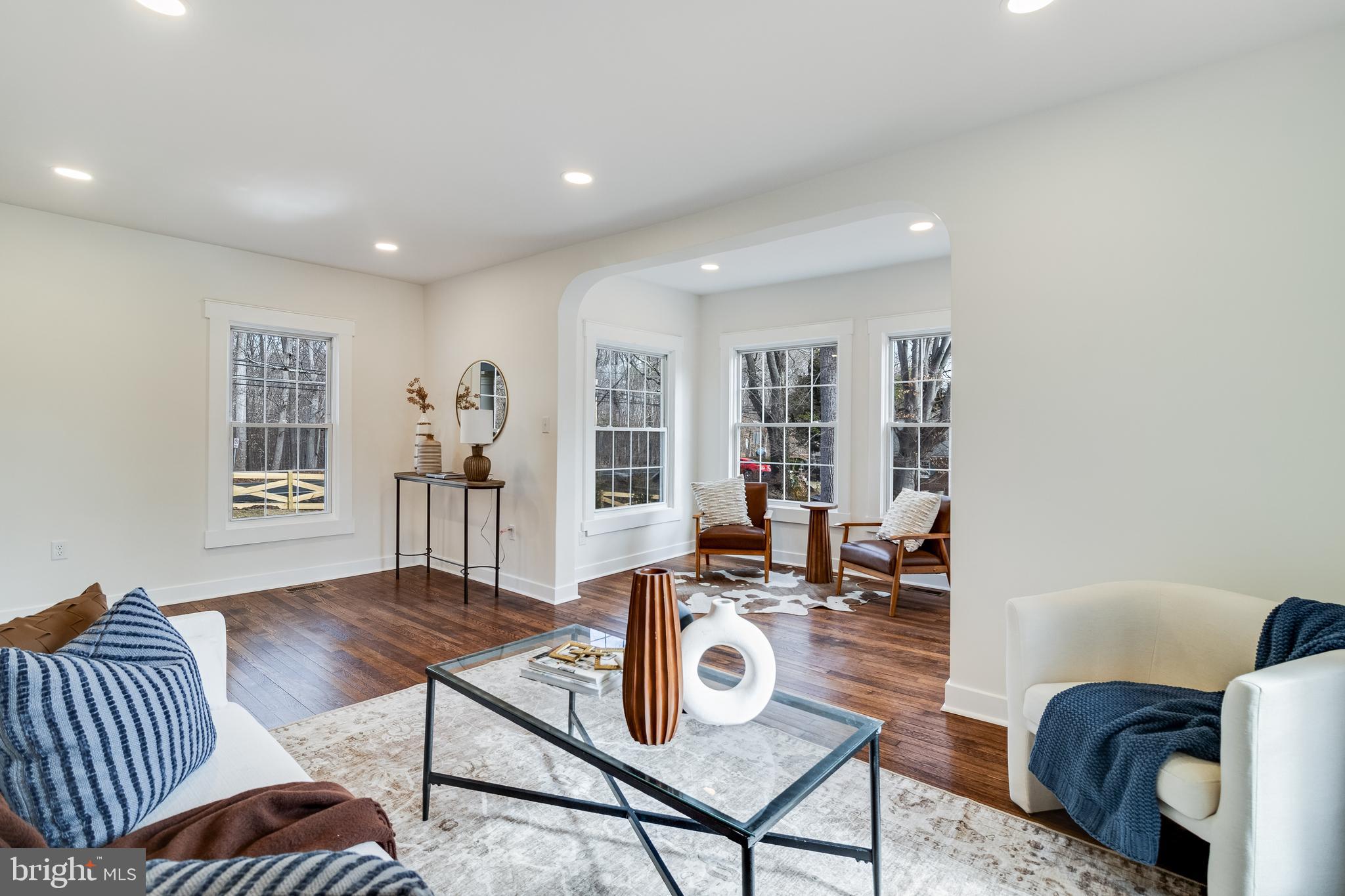 9316 Croom Road Upper Marlboro, MD 20772 - Photo 8 of 61 a living room with furniture and a table