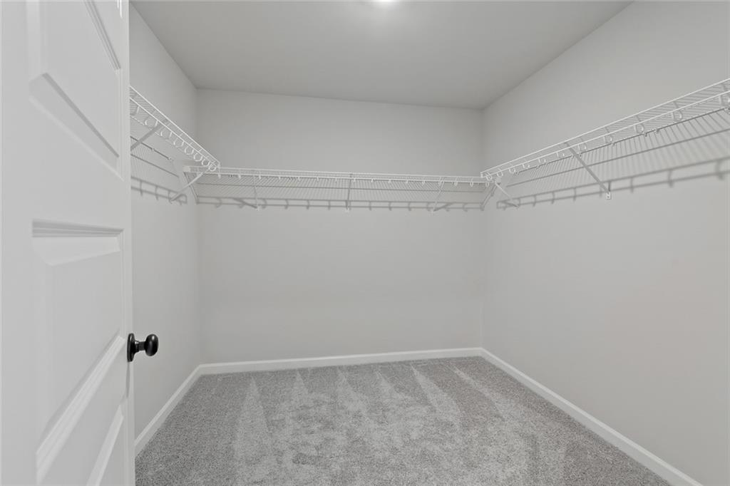 73 Cardinal Pond Lane Winder, GA 30680 - Photo 26 of 59 a view of an empty walk in closet