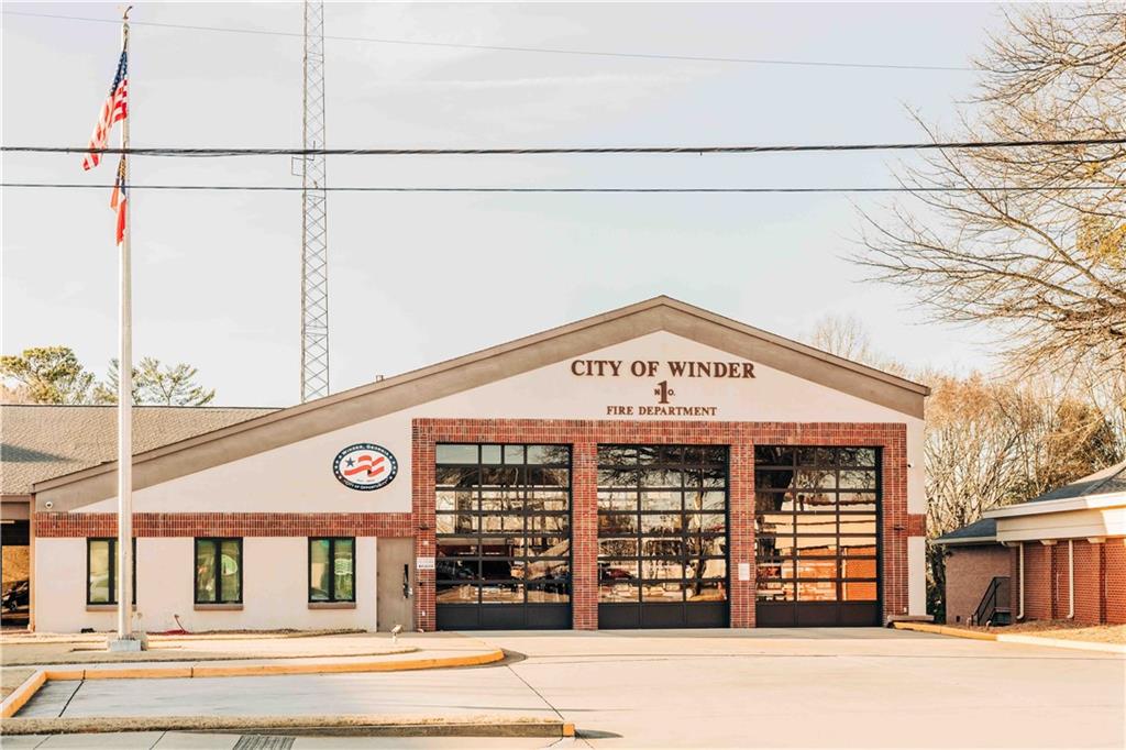 73 Cardinal Pond Lane Winder, GA 30680 - Photo 40 of 59 a view of a building with a street