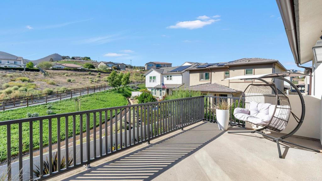 2904 Starry Night Drive Escondido, CA 92029 - Photo 14 of 54 a view of a chair and tables in the balcony
