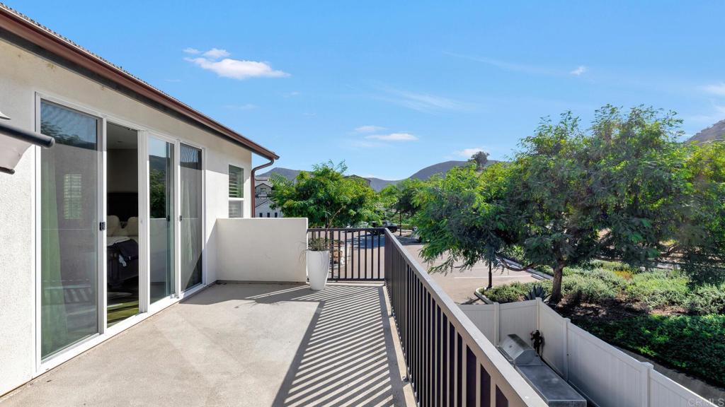 2904 Starry Night Drive Escondido, CA 92029 - Photo 15 of 54 a view of a roof deck with wooden floor and fence