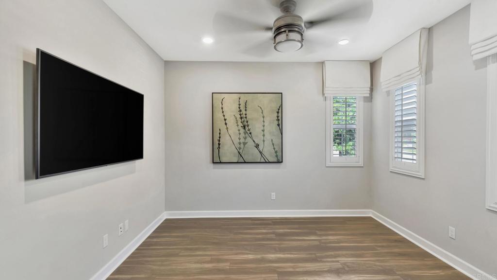 2904 Starry Night Drive Escondido, CA 92029 - Photo 26 of 54 an empty room with windows and fan