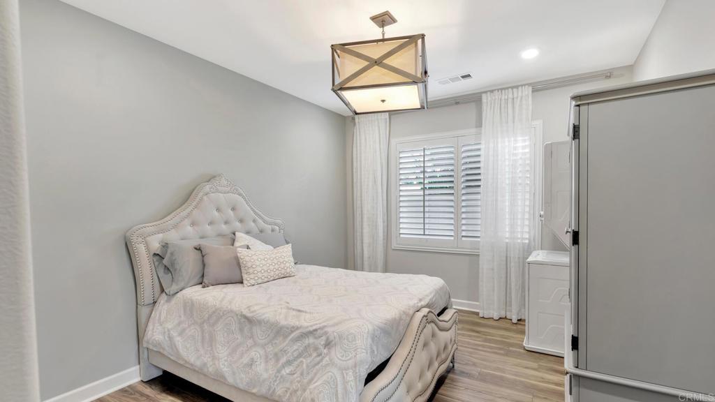 2904 Starry Night Drive Escondido, CA 92029 - Photo 28 of 54 a bedroom with a bed and a window