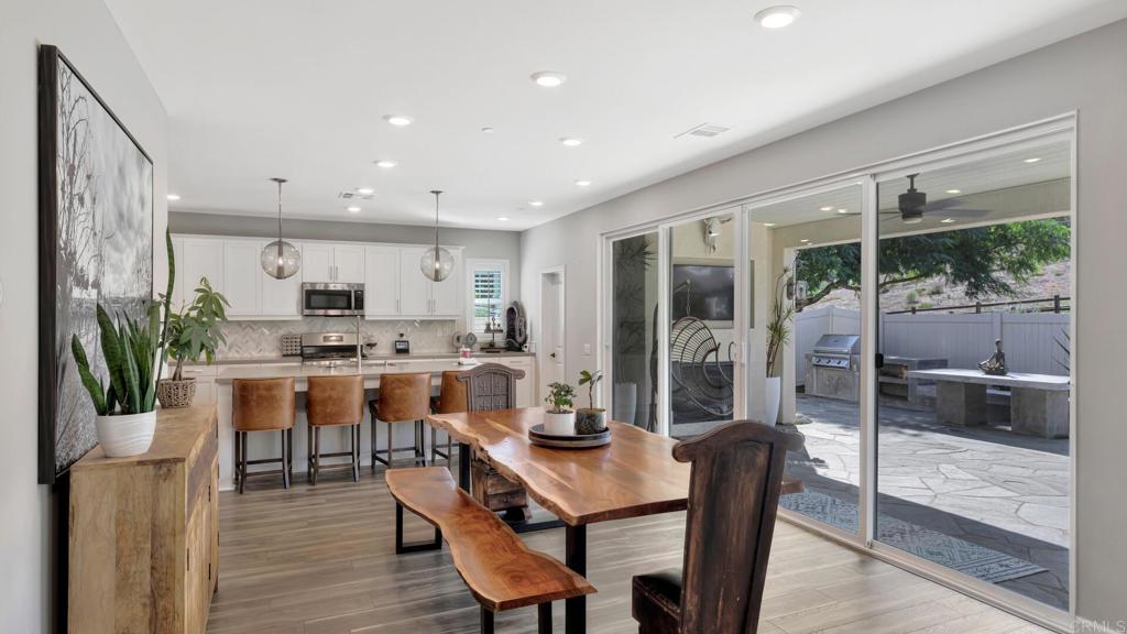 2904 Starry Night Drive Escondido, CA 92029 - Photo 5 of 54 a kitchen with a table and chairs in it