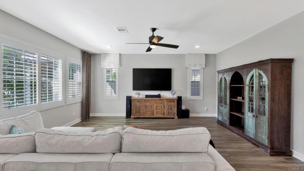 2904 Starry Night Drive Escondido, CA 92029 - Photo 7 of 54 a living room with furniture and a flat screen tv