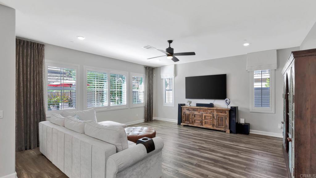 2904 Starry Night Drive Escondido, CA 92029 - Photo 8 of 54 a living room with furniture and a flat screen tv