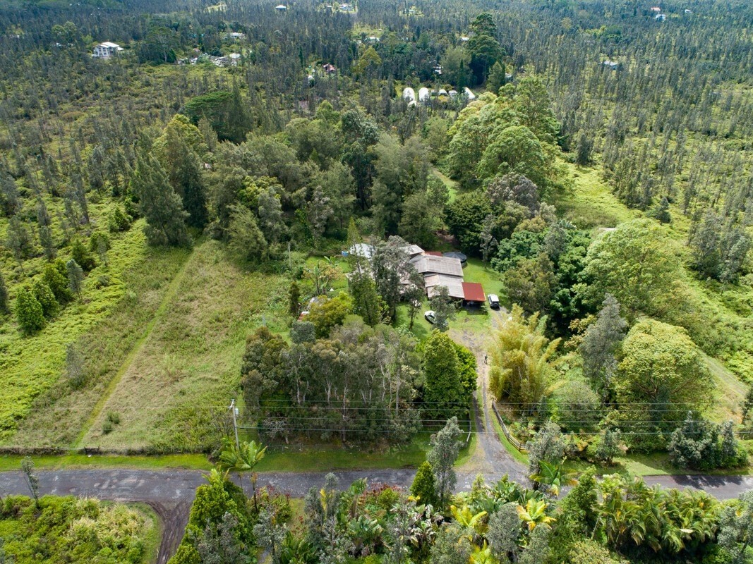 16-2006 Uhini Ana Road Mountain View, HI 96771 - Photo 3 of 25 an aerial view of residential house with outdoor space and trees all around