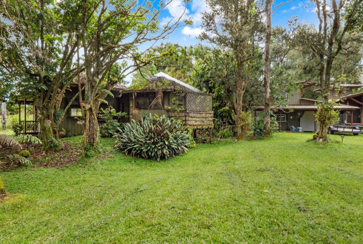 16-2006 Uhini Ana Road Mountain View, HI 96771 - Photo 8 of 25 a view of a house with a yard