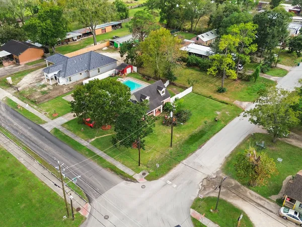 an aerial view of a house with a garden