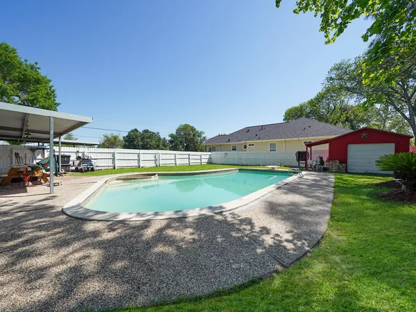 a view of outdoor space yard and swimming pool