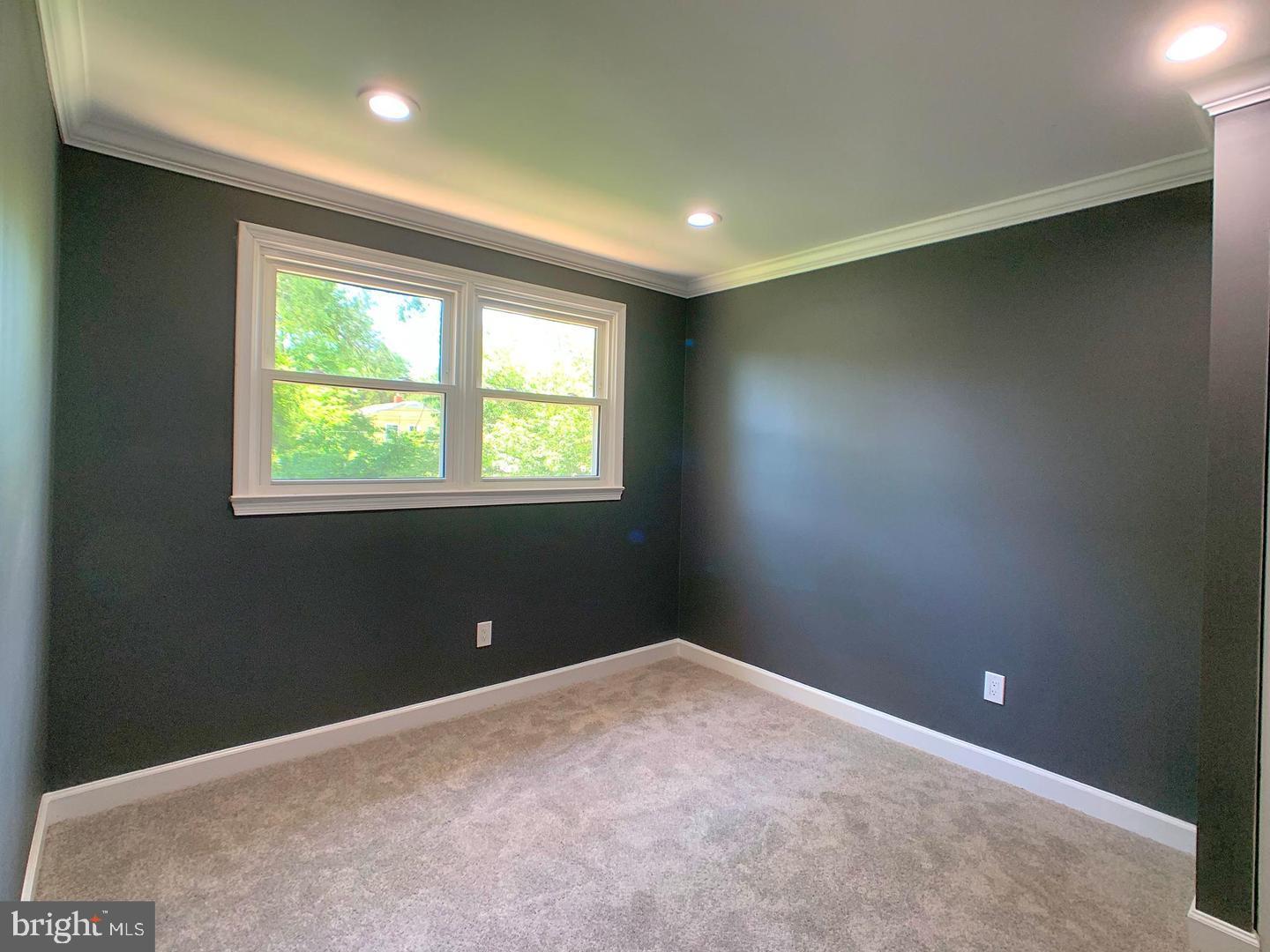 7907 Subet Road Windsor Mill, MD 21244 - Photo 17 of 31 a view of an empty room with a window