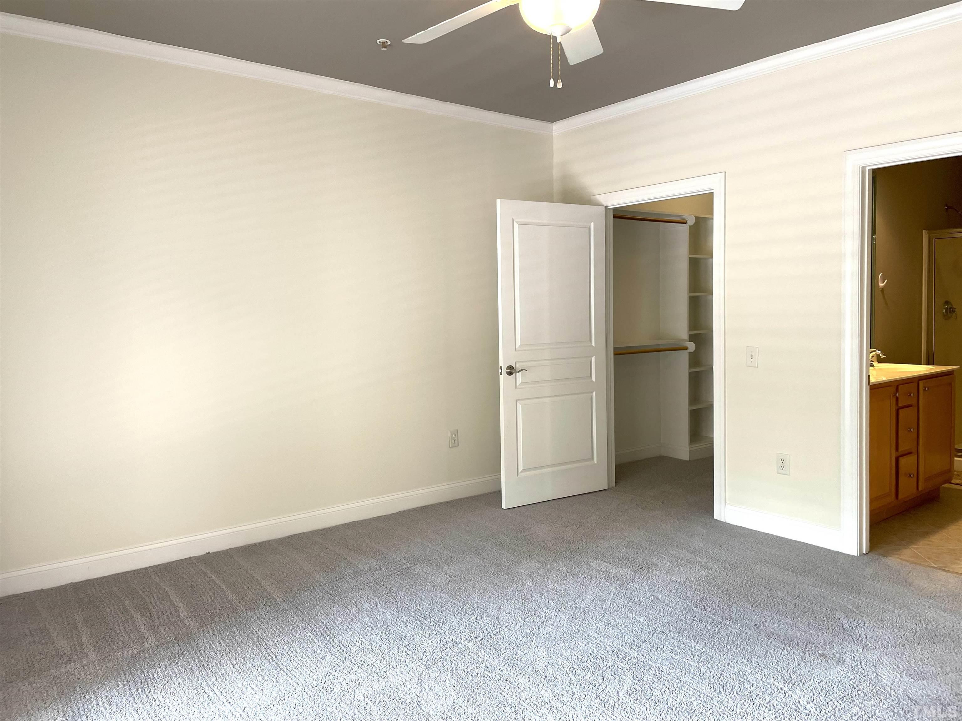 7510 Lead Mine Road, Unit 102 Raleigh, NC 27615 - Photo 13 of 25 an empty room with closet area