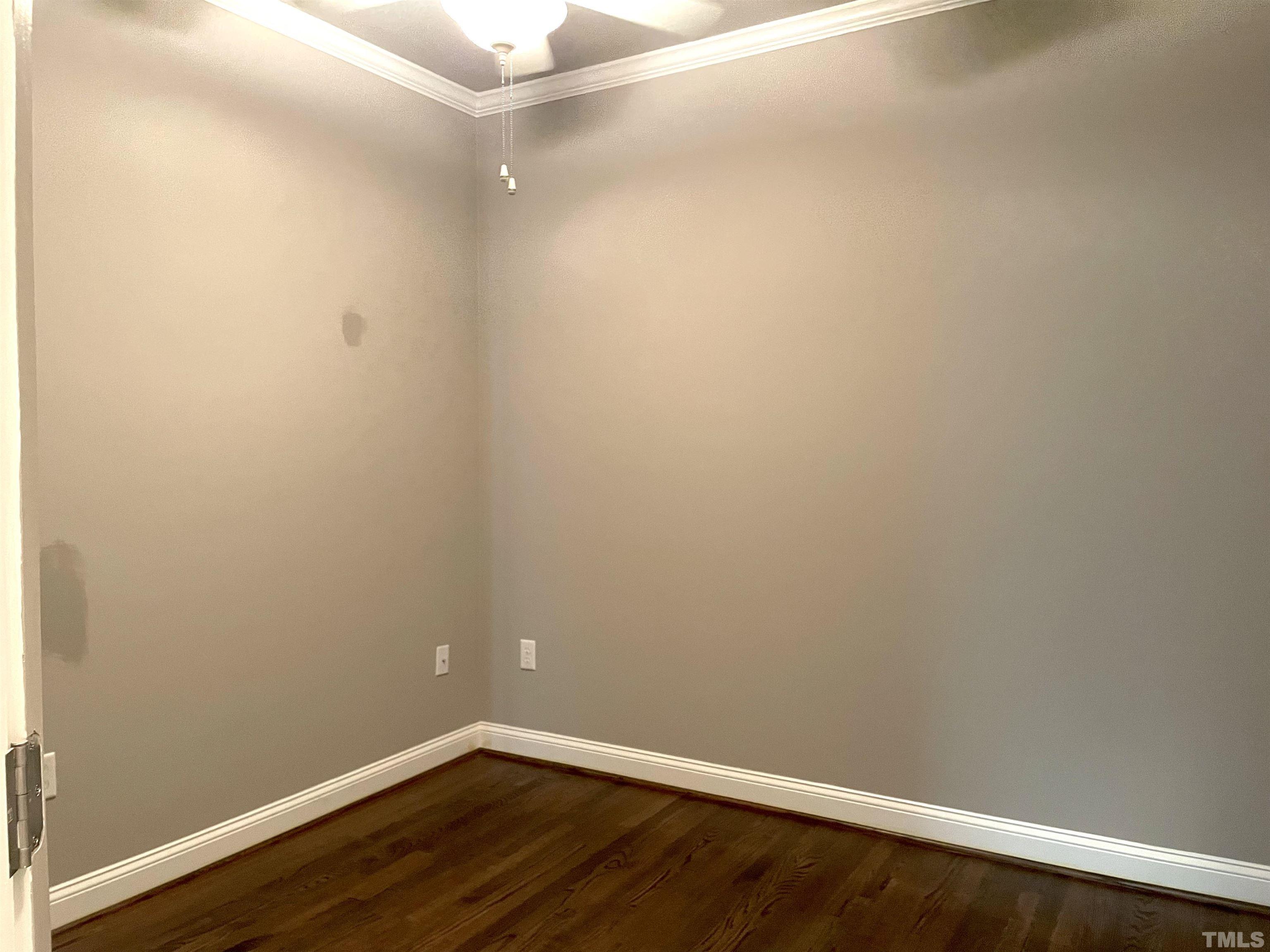 7510 Lead Mine Road, Unit 102 Raleigh, NC 27615 - Photo 18 of 25 a view of a small space with wooden floor