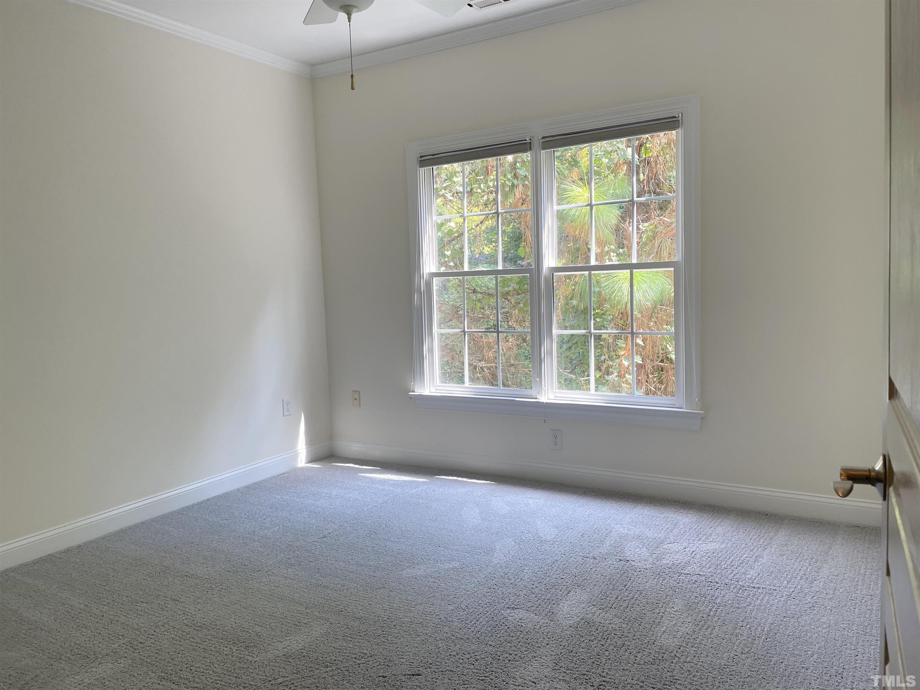 7510 Lead Mine Road, Unit 102 Raleigh, NC 27615 - Photo 20 of 25 an empty room with a window