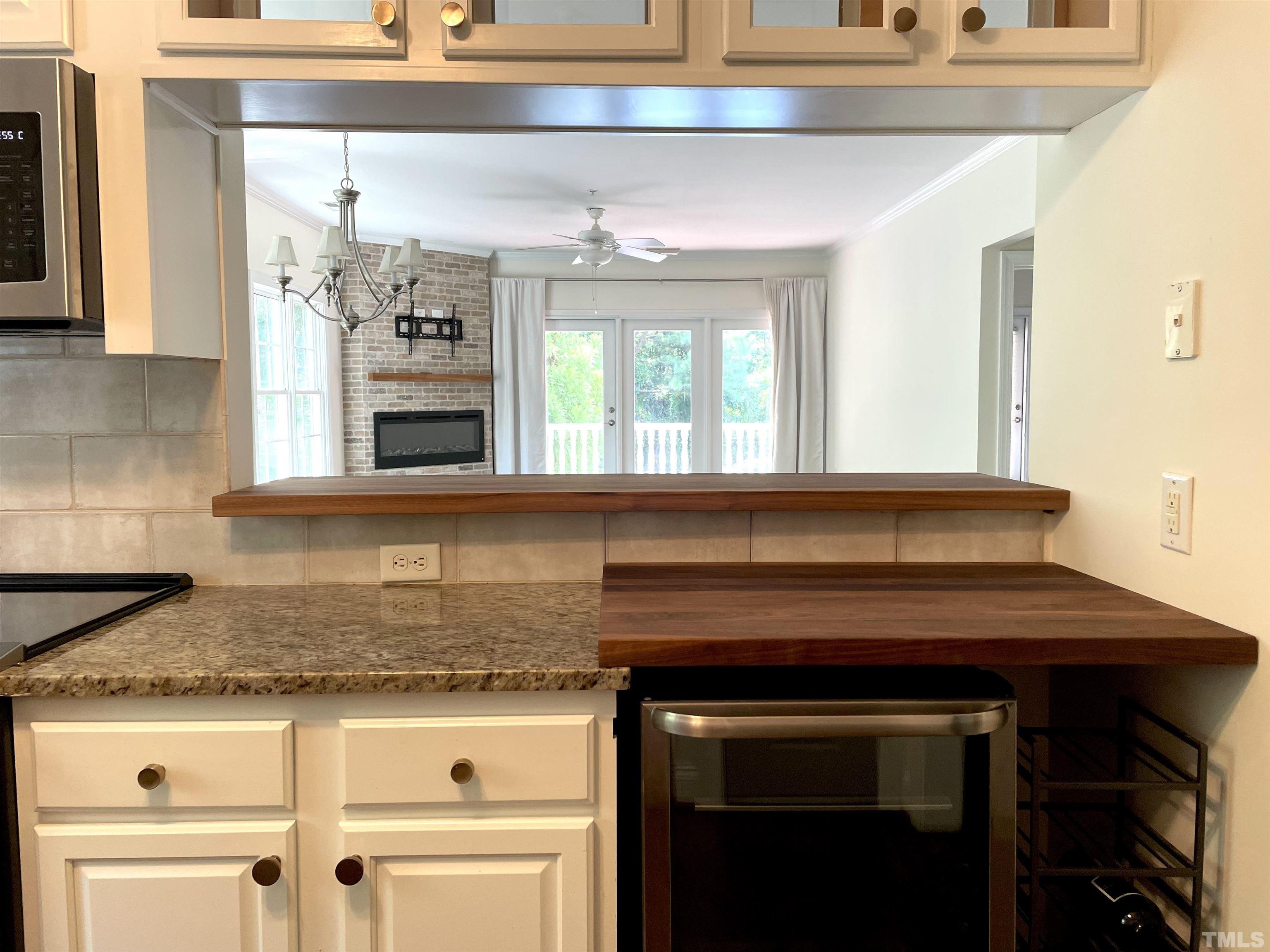 7510 Lead Mine Road, Unit 102 Raleigh, NC 27615 - Photo 3 of 25 a kitchen with a sink and cabinets