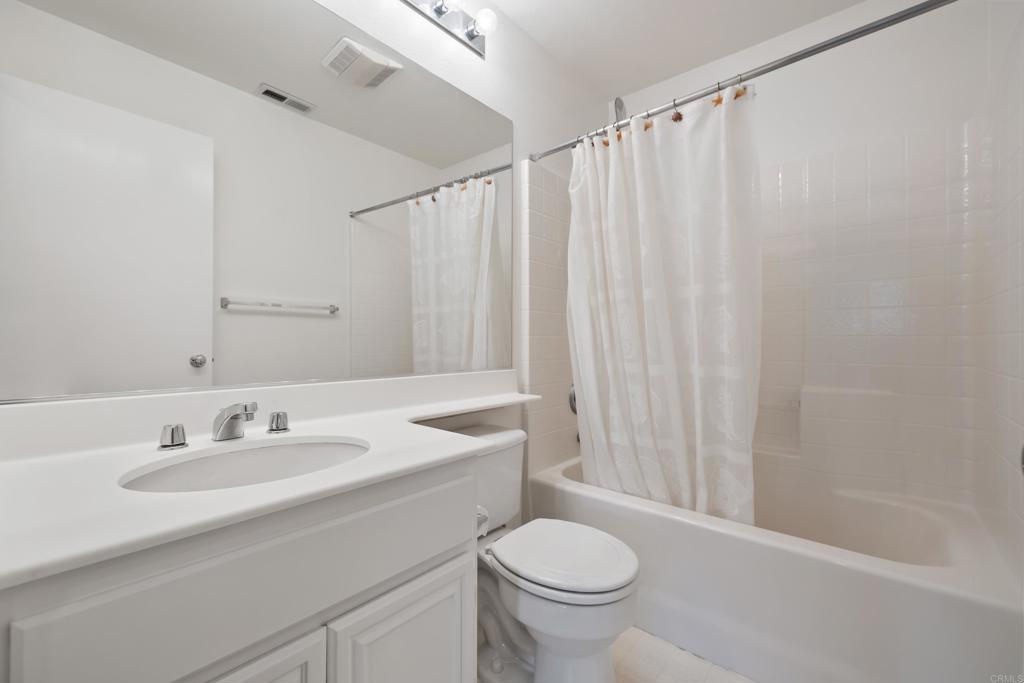 424 Dakota Way Oceanside, CA 92056 - Photo 15 of 31 a bathroom with a sink toilet and shower