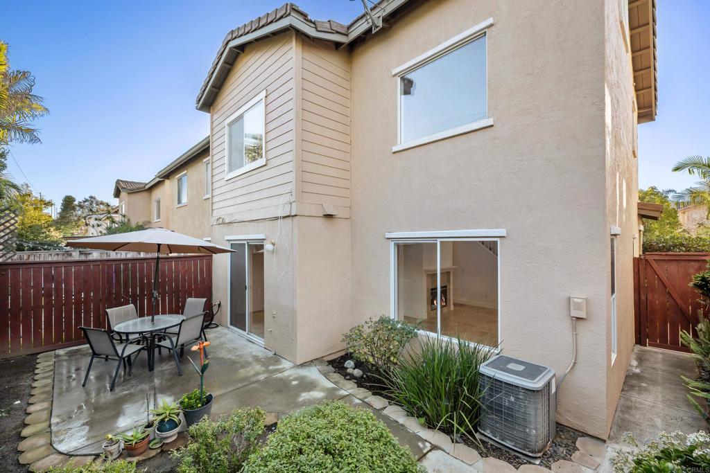424 Dakota Way Oceanside, CA 92056 - Photo 23 of 31 a view of a chair and table in backyard of the house