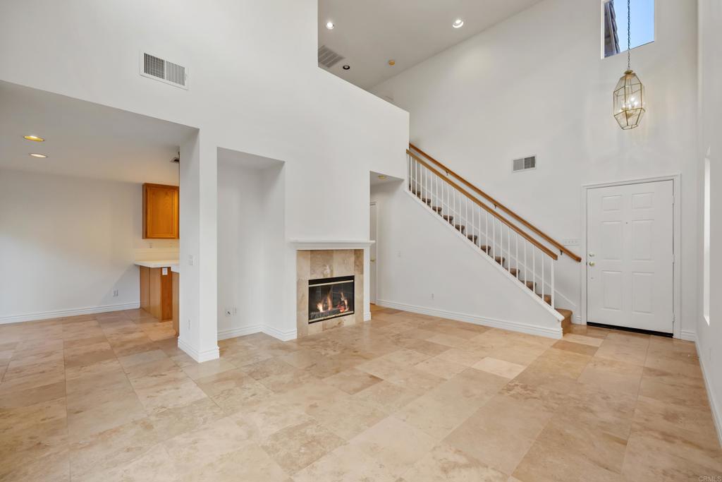 424 Dakota Way Oceanside, CA 92056 - Photo 4 of 31 a view of a livingroom with an empty space and a fireplace