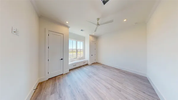 a view of an empty room and window