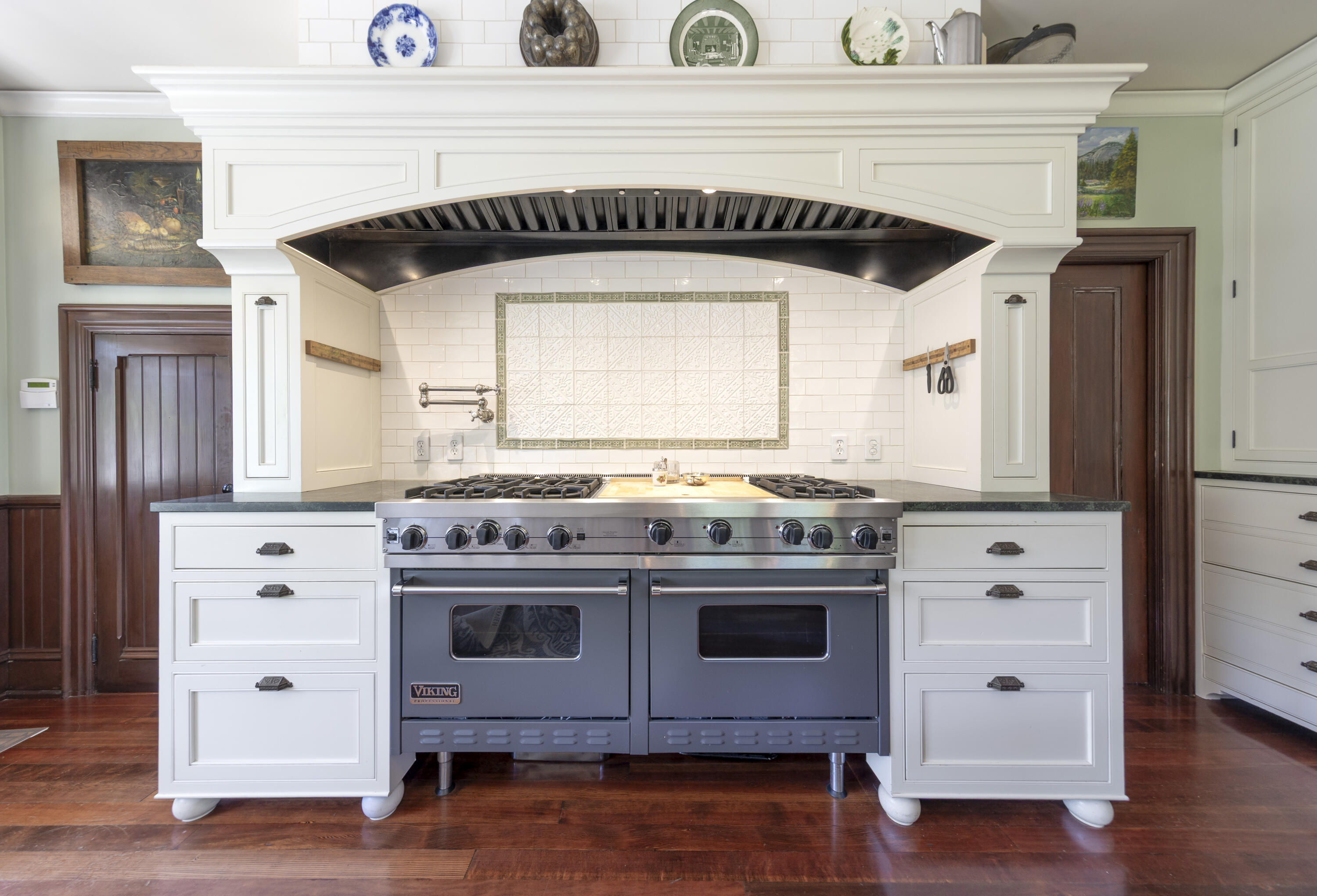118 East Islay Street Santa Barbara, CA 93101 - Photo 15 of 44 a kitchen with a stove and a microwave
